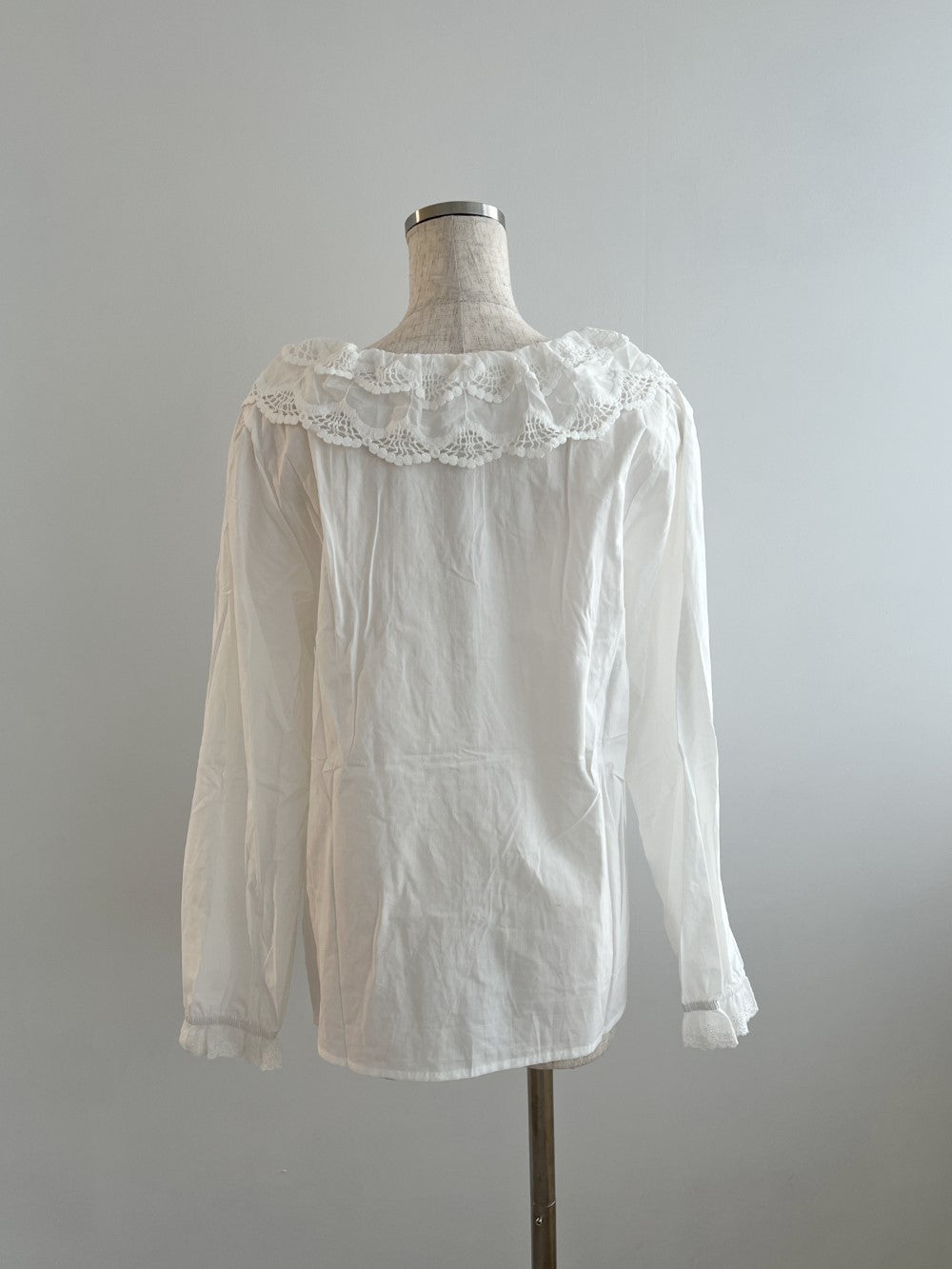 <SL2243642> frill teard hem blouse