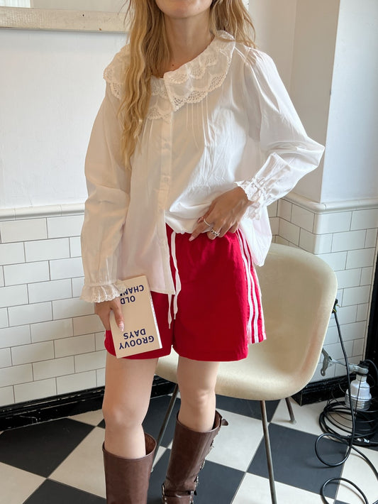 <SL2243642> frill teard hem blouse